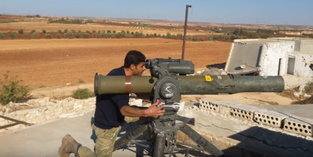 Rebel-militant-with-TOW-missile.png